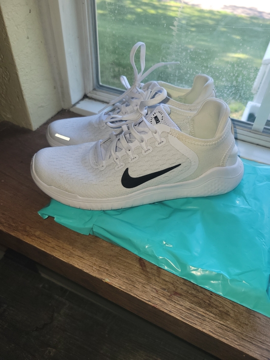 Nike Shoes - Nike Women's White Running Shoes with Black Swoosh